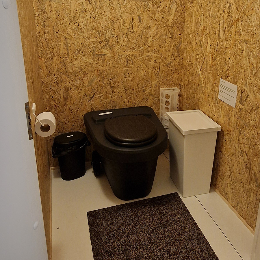 composting toilet on flat floor