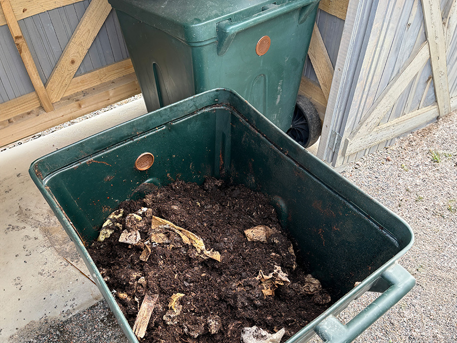 green toilet composting container from inside image