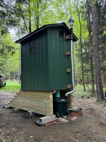 lifted outhouse