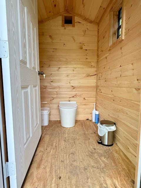lifted outhouse