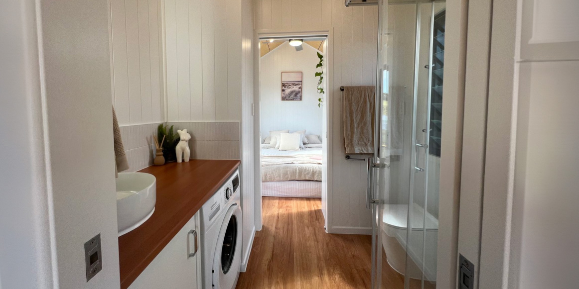 tiny home with modern appliances and a composting toilet