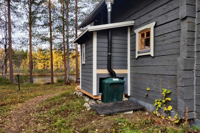 outhouse next to winter cottage 