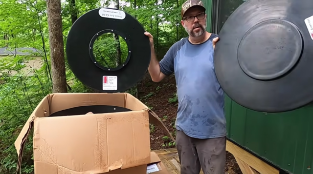 Scott GL 90 lids in his hands